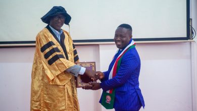 Photo of Dr. Yamoah recognized for outstanding contribution to finance